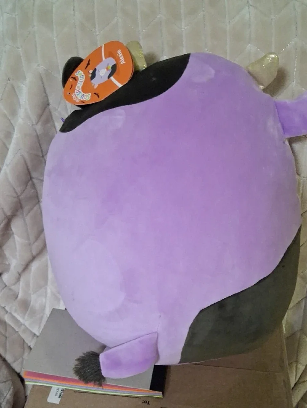 Squishmallow-Alexie, The purple Halloween Cow.